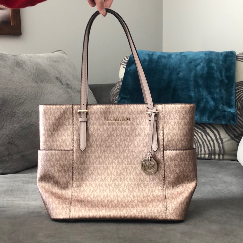 Metallic rose gold Michael Kors purse